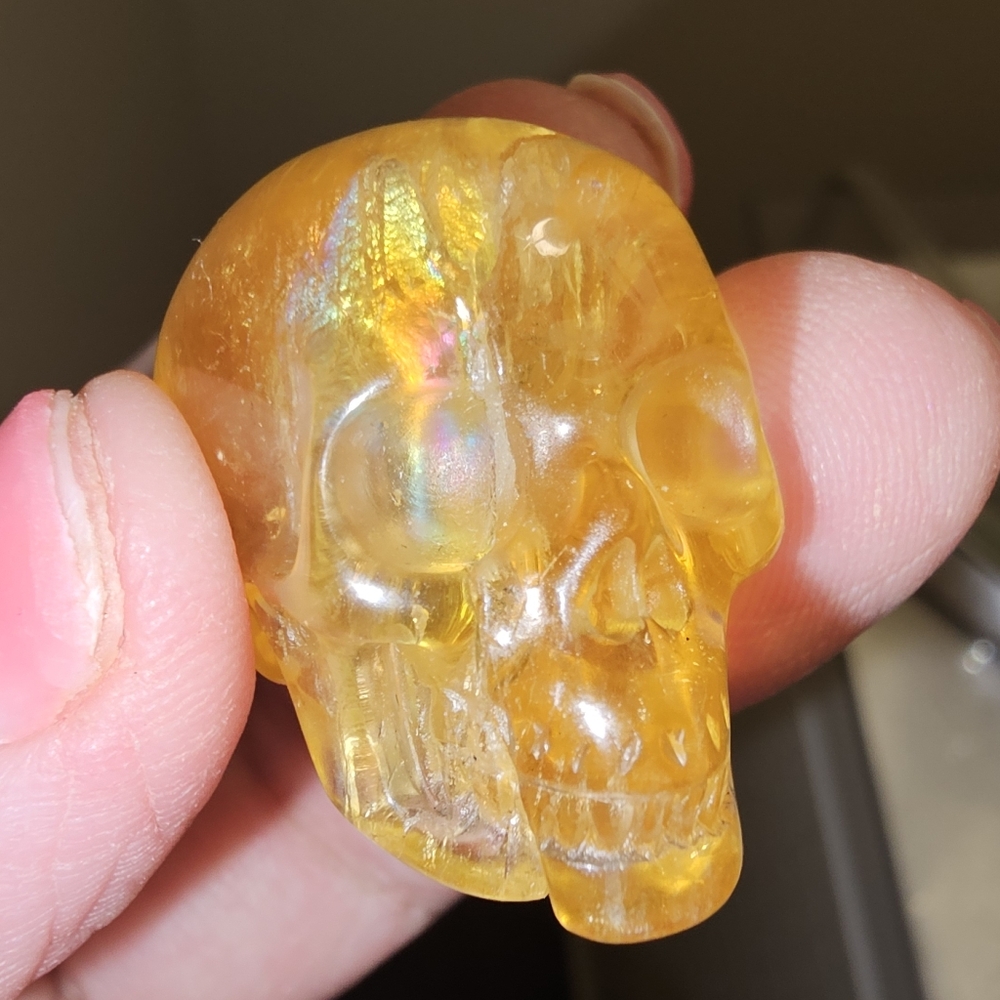 21 grams, 26.5 mm Orange Fluorite Carved Skull with Rainbow!🌈 New!